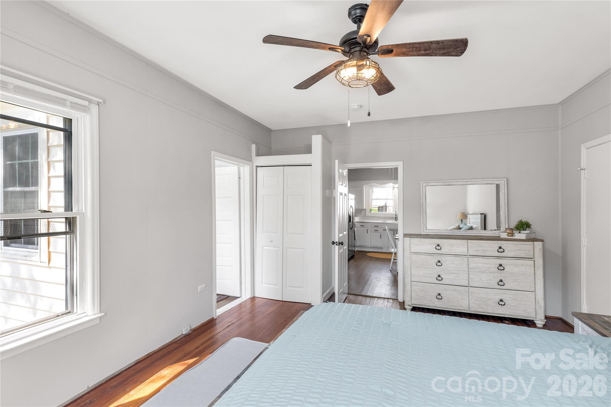 206 McConnell Street Clover, SC 29710 - Photo 14 of 31 a room with a bed chandelier and a window