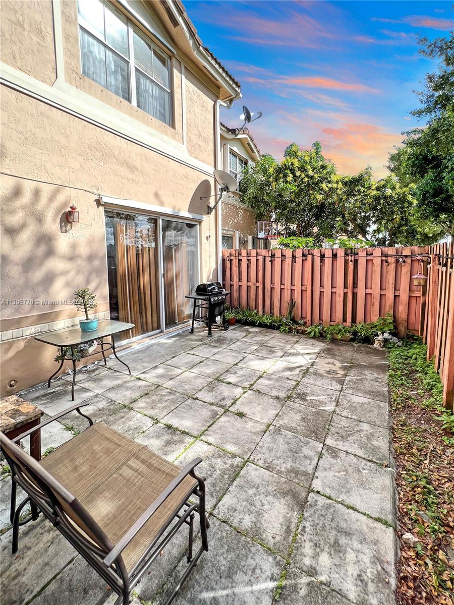 12524 Southwest 126th Avenue Miami, FL 33186 - Photo 23 of 23 a view of a backyard with a sitting area
