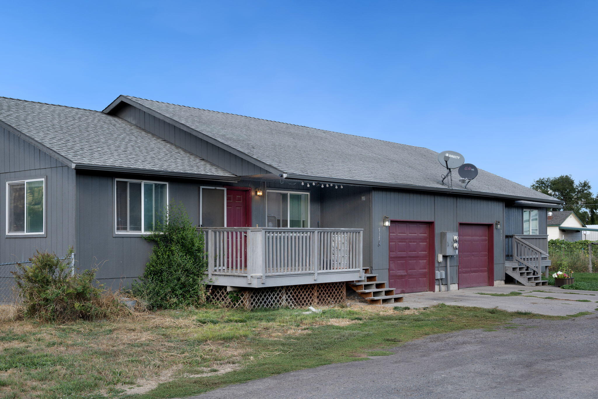 937 Northwest Cains Road, Unit A Prineville, OR 97754 - Photo 1 of 24 a front view of a house with garden