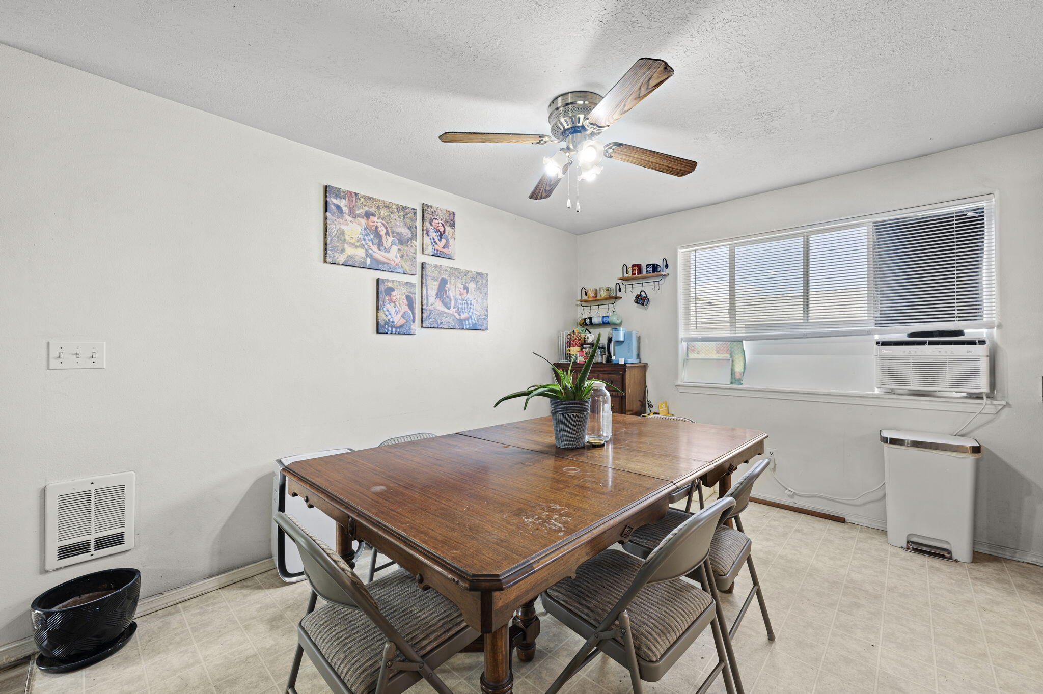 937 Northwest Cains Road, Unit A Prineville, OR 97754 - Photo 16 of 24 a kitchen with a table chairs and cabinets