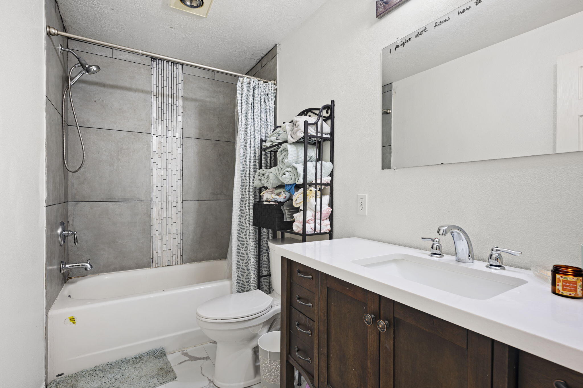 937 Northwest Cains Road, Unit A Prineville, OR 97754 - Photo 21 of 24 a bathroom with a sink toilet vanity and shower