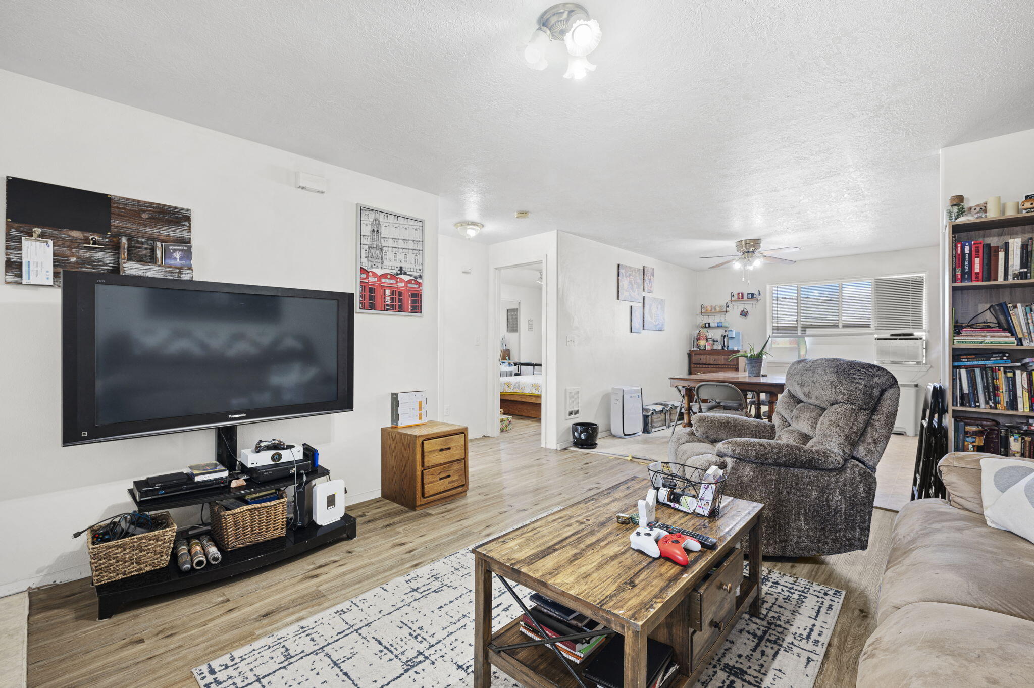 937 Northwest Cains Road, Unit A Prineville, OR 97754 - Photo 6 of 24 a living room with furniture and a flat screen tv