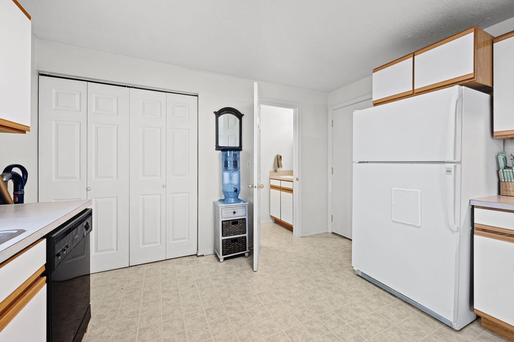 937 Northwest Cains Road, Unit A Prineville, OR 97754 - Photo 9 of 24 a view of hallway with cabinets