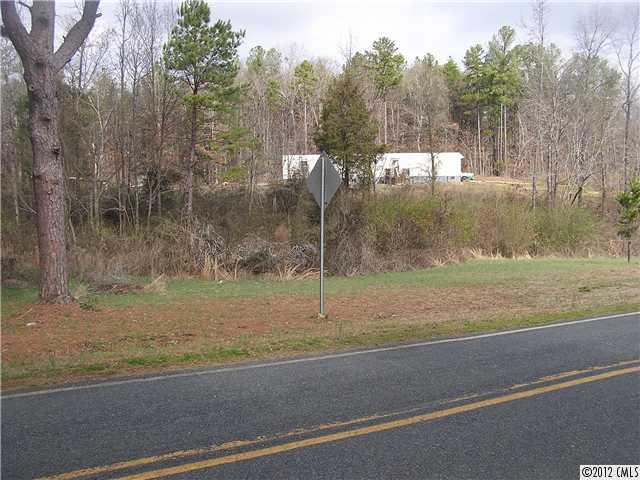 294 Russell Road Polkton, NC 28135 - Photo 1 of 16 a view of a backyard of a house