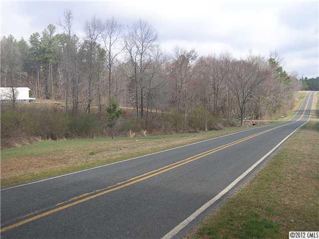 294 Russell Road Polkton, NC 28135 - Photo 11 of 16 a view of a yard with a trampoline