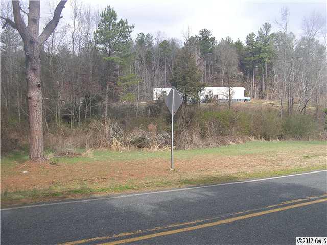 294 Russell Road Polkton, NC 28135 - Photo 12 of 16 a view of a water fountain with wooden fence