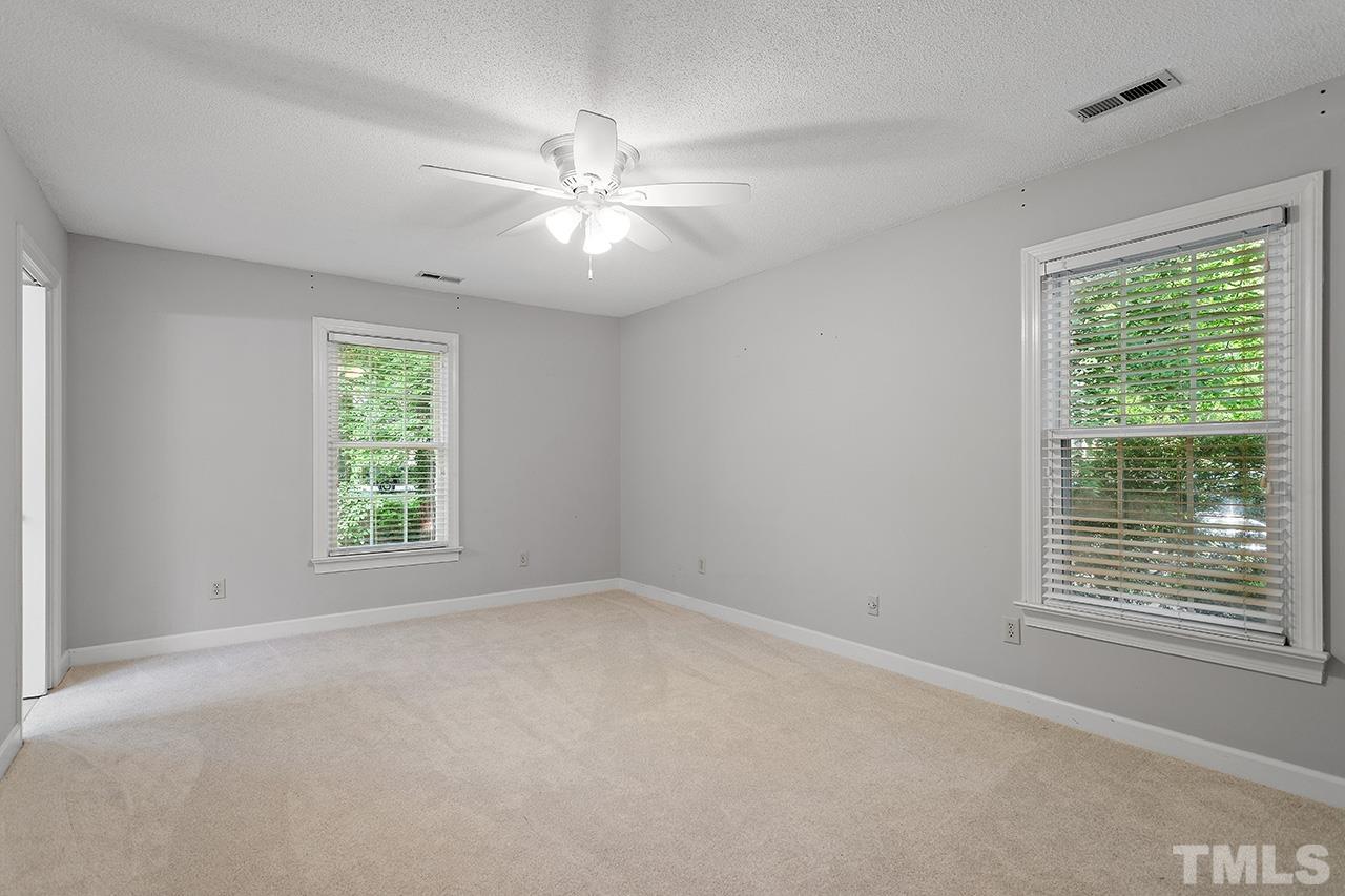 8408 Morgans Way Raleigh, NC 27613 - Photo 17 of 34 a view of an empty room with a window