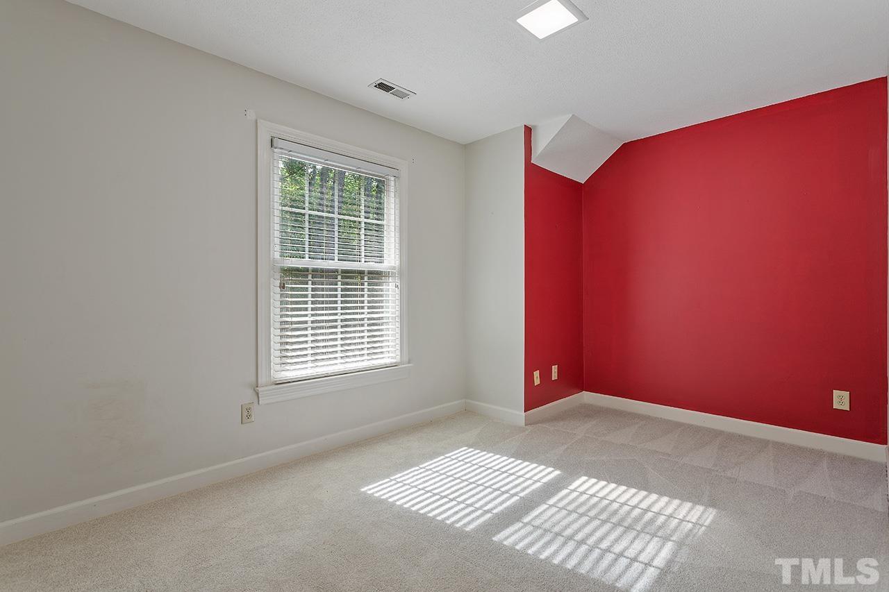 8408 Morgans Way Raleigh, NC 27613 - Photo 22 of 34 a view of an empty room with a window