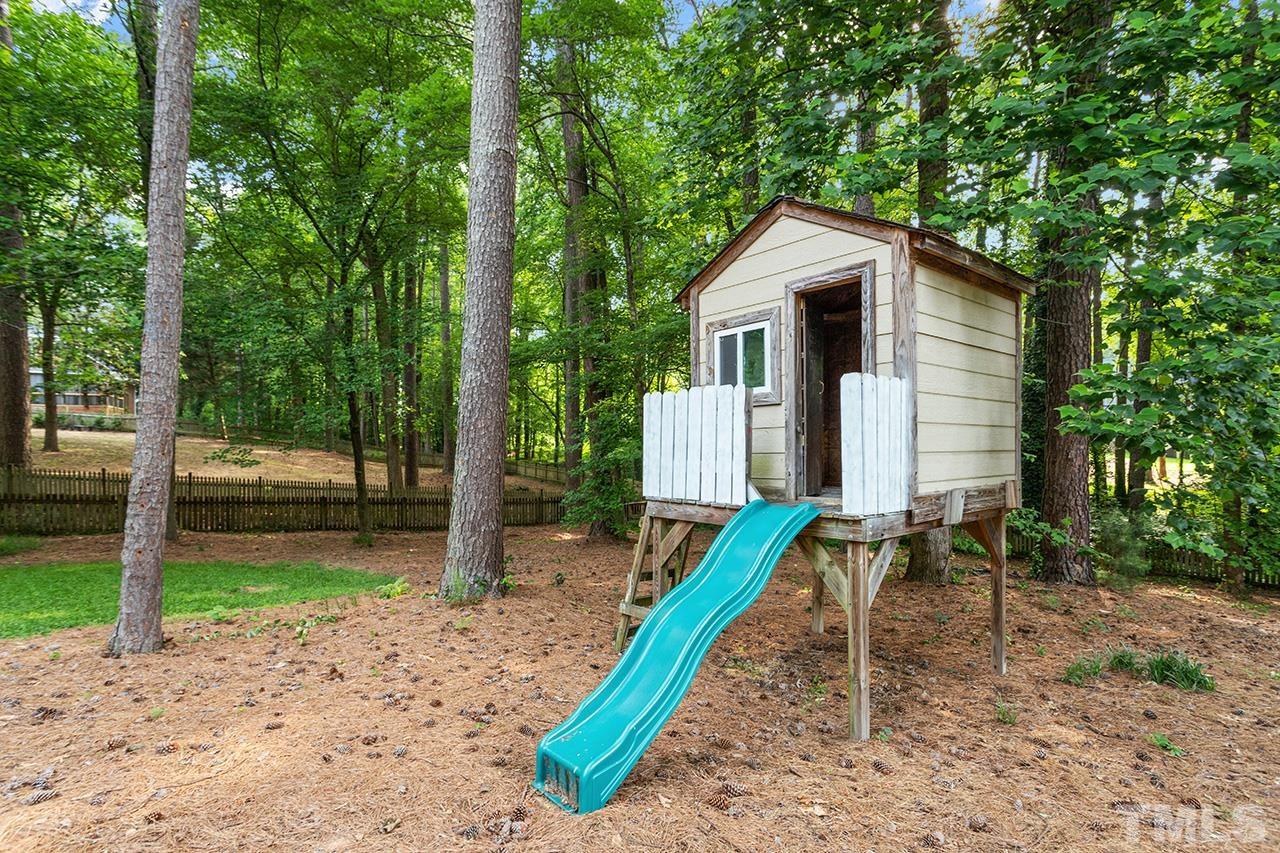 8408 Morgans Way Raleigh, NC 27613 - Photo 31 of 34 a house view with a backyard space