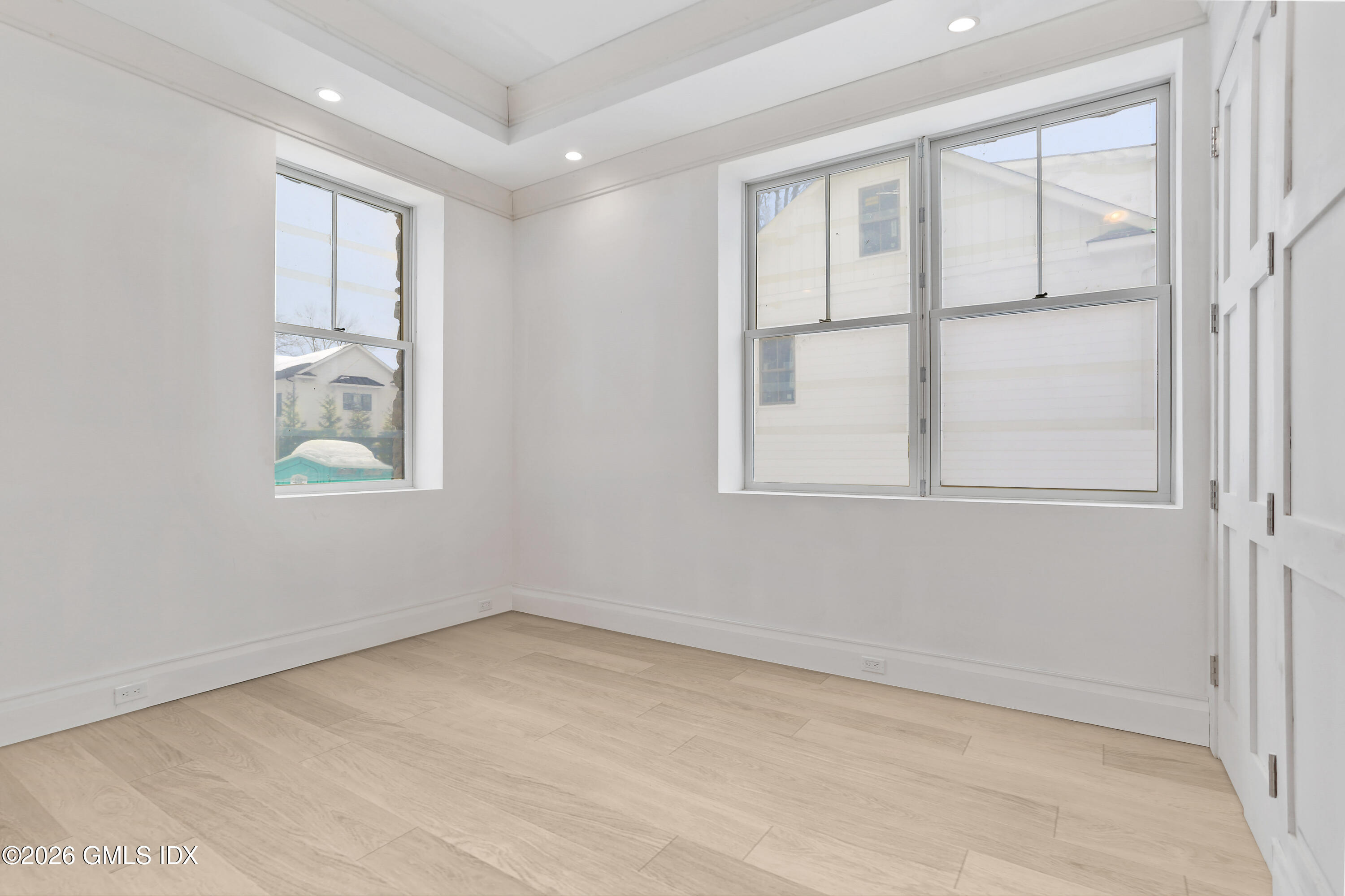 112 Sheep Hill Road Riverside, CT 06878 - Photo 21 of 30 an empty room with windows