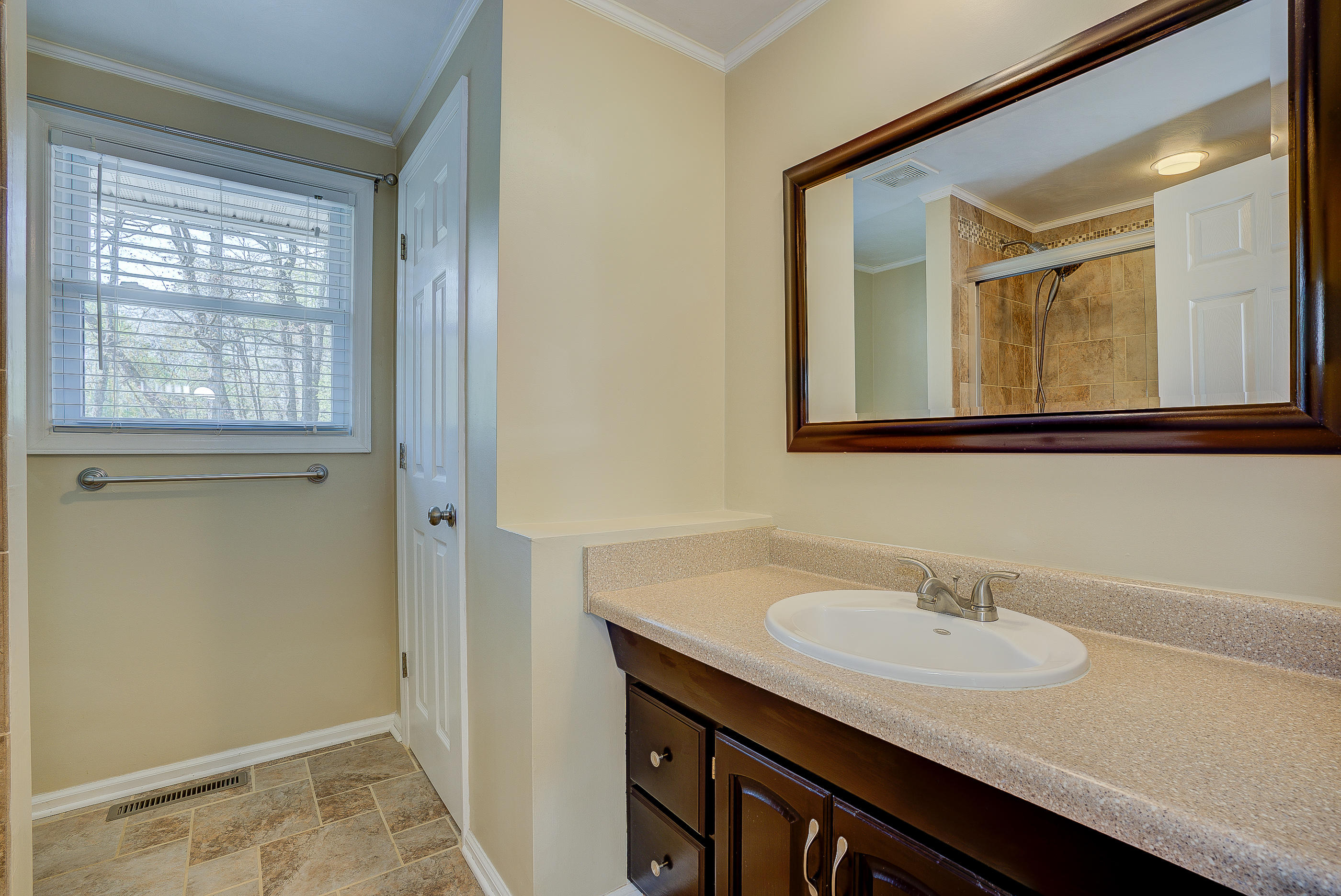 12267 Hardy Road Hardy, VA 24101 - Photo 13 of 24 a bathroom with a sink and a mirror