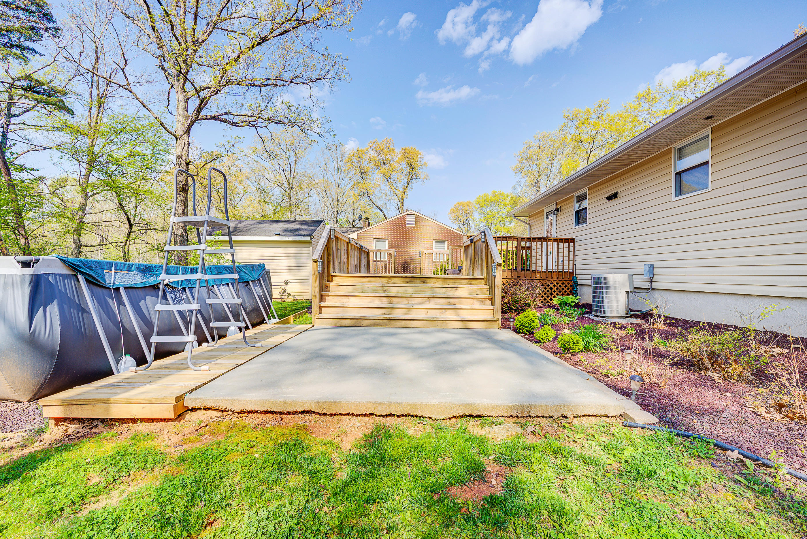 12267 Hardy Road Hardy, VA 24101 - Photo 22 of 24 a view of backyard with swimming pool and seating space