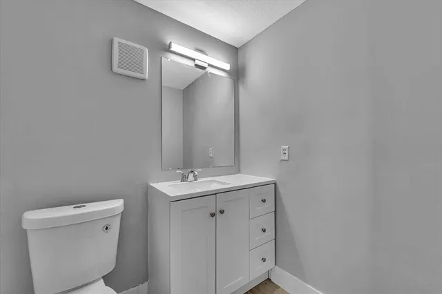 a bathroom with a sink toilet and bathtub