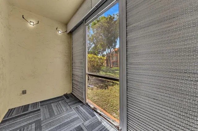 a sign that is sitting on a brick wall