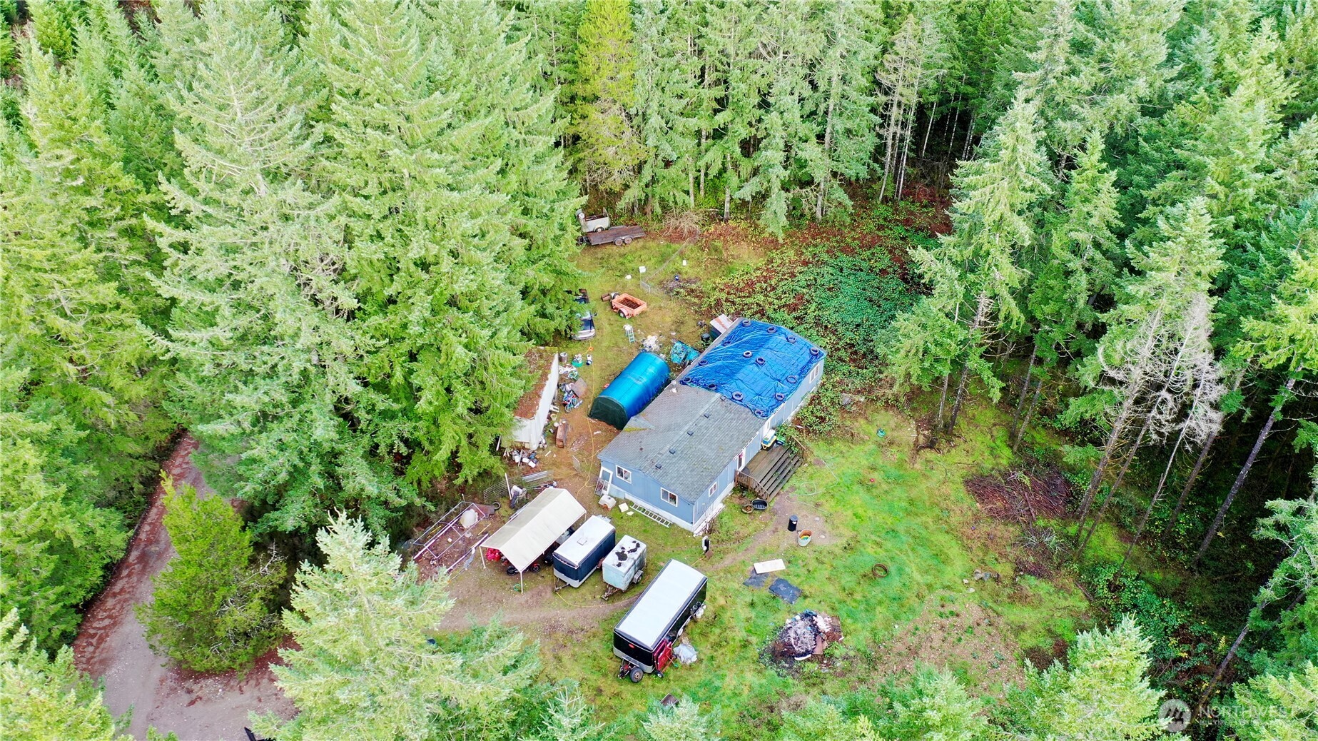 10185 May Ranch Lane Southwest Port Orchard, WA 98367 - Photo 3 of 14 an aerial view of a house with a yard