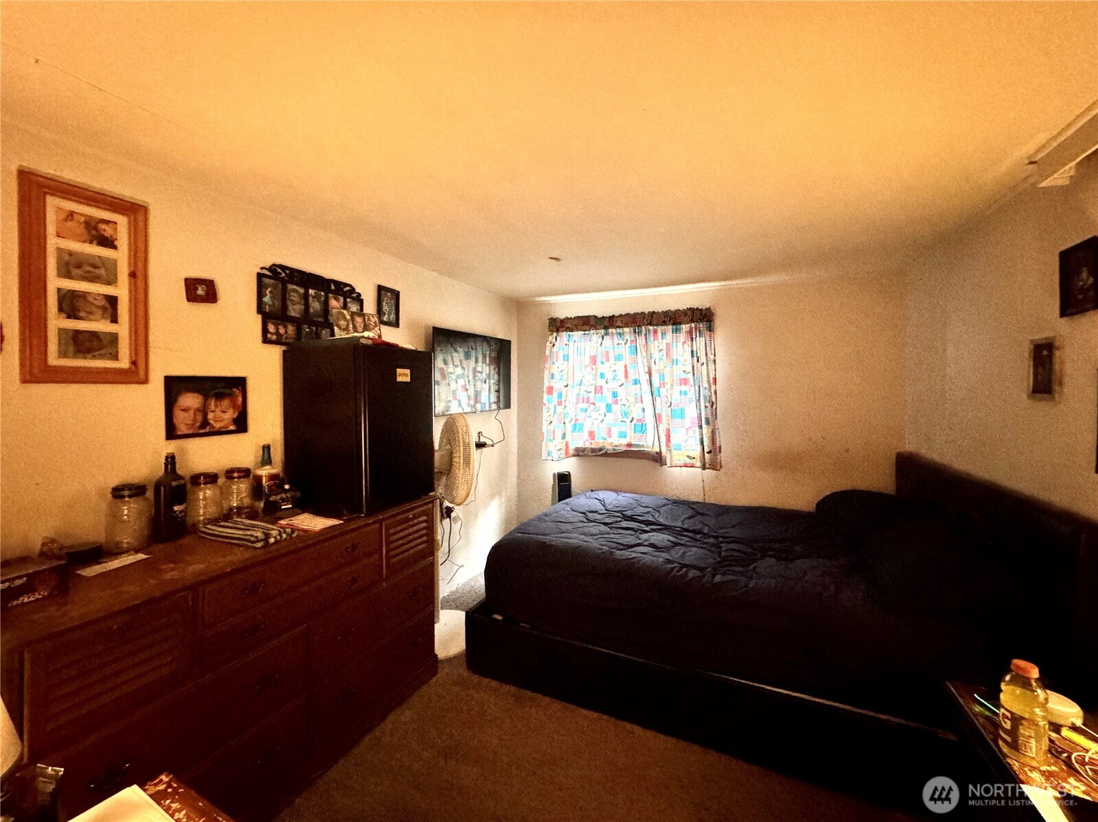 10185 May Ranch Lane Southwest Port Orchard, WA 98367 - Photo 7 of 14 a bedroom with a bed and a flat screen tv