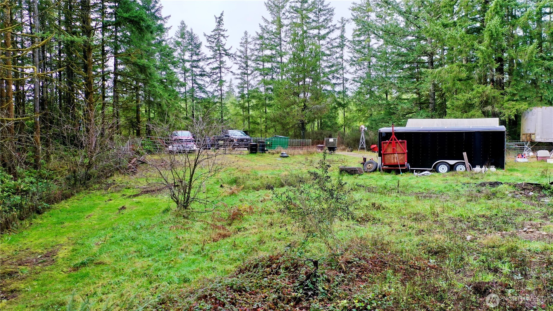 10185 May Ranch Lane Southwest Port Orchard, WA 98367 - Photo 8 of 14 a view of a house with backyard
