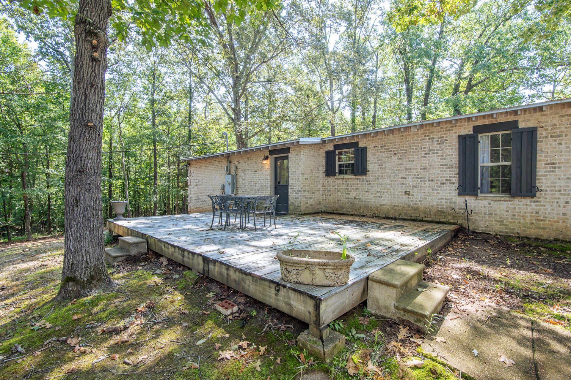 2395 Pocahontas Road Pocahontas, TN 38061 - Photo 18 of 38 a view of a house with pool table and chairs in a yard
