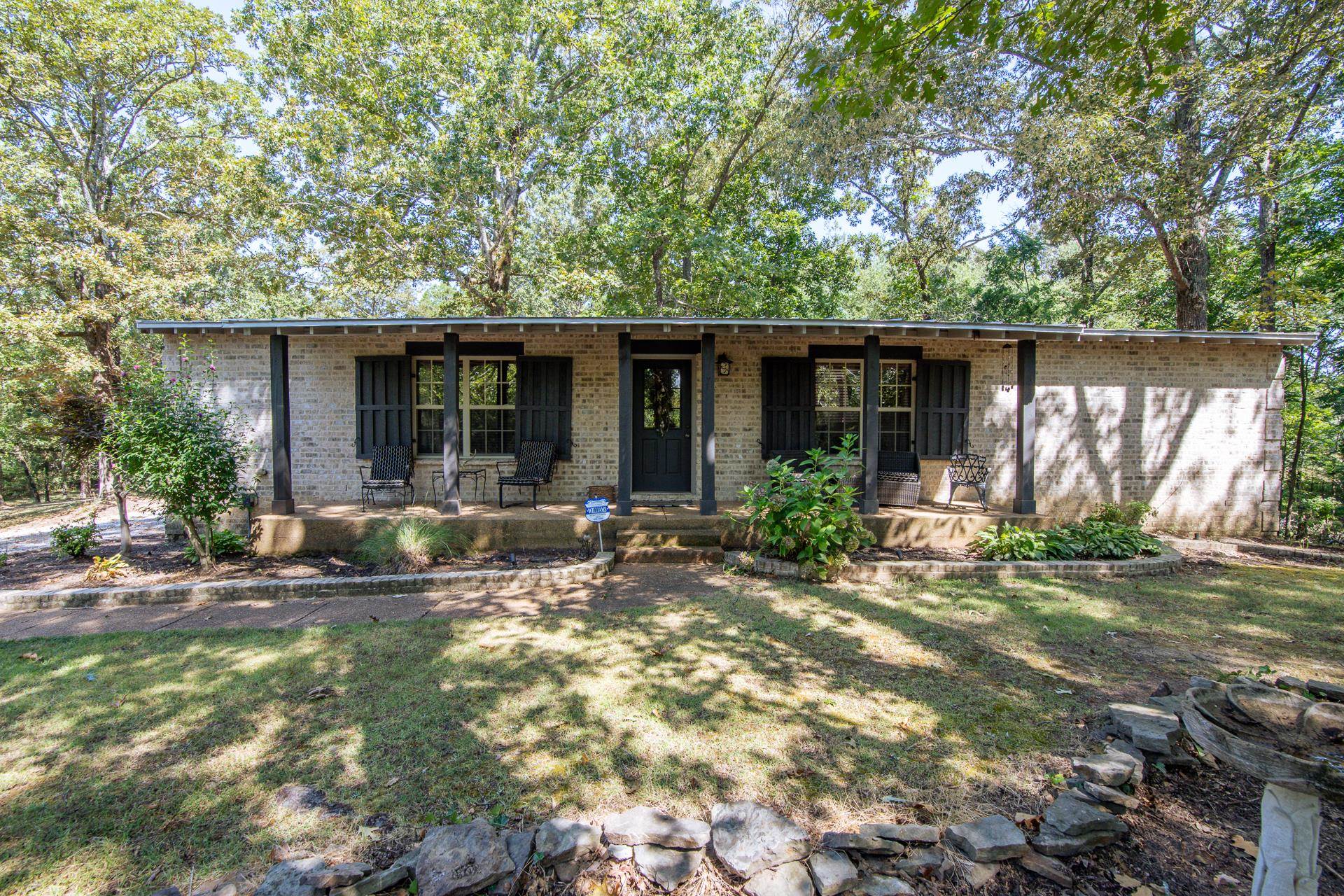2395 Pocahontas Road Pocahontas, TN 38061 - Photo 33 of 38 a view of house with backyard outdoor seating and yard