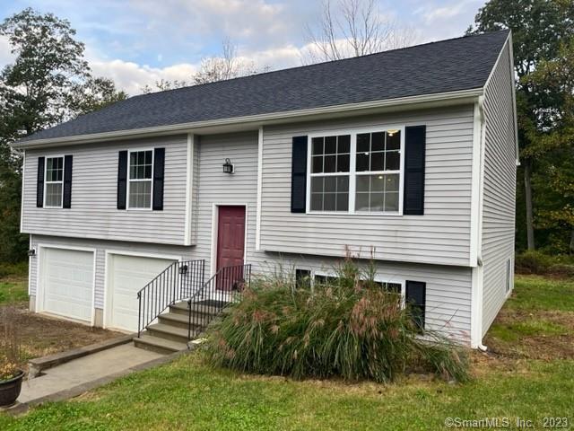 260 Rattlesnake Ledge Road Salem, CT 06420 - Photo 1 of 1 a front view of a house with a yard