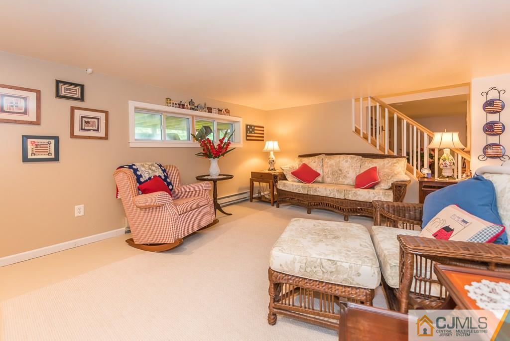 21 Mill Street Stockton, NJ 08559 - Photo 16 of 25 a bedroom with furniture and a couch