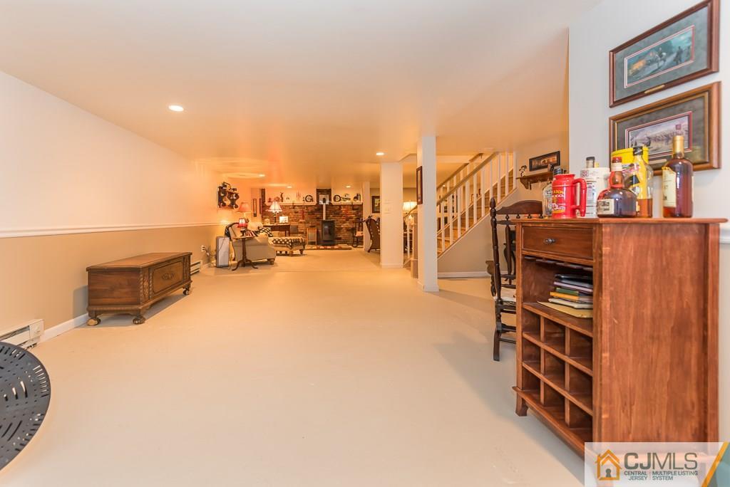 21 Mill Street Stockton, NJ 08559 - Photo 21 of 25 a view of a living room and utility room