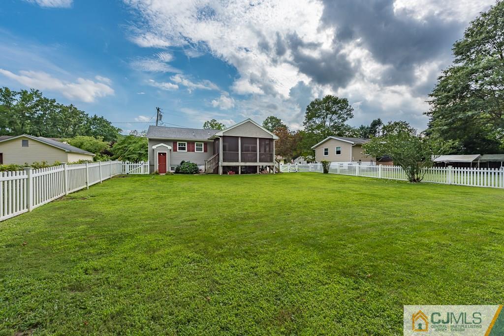 21 Mill Street Stockton, NJ 08559 - Photo 25 of 25 a view of a house with a big yard and large trees