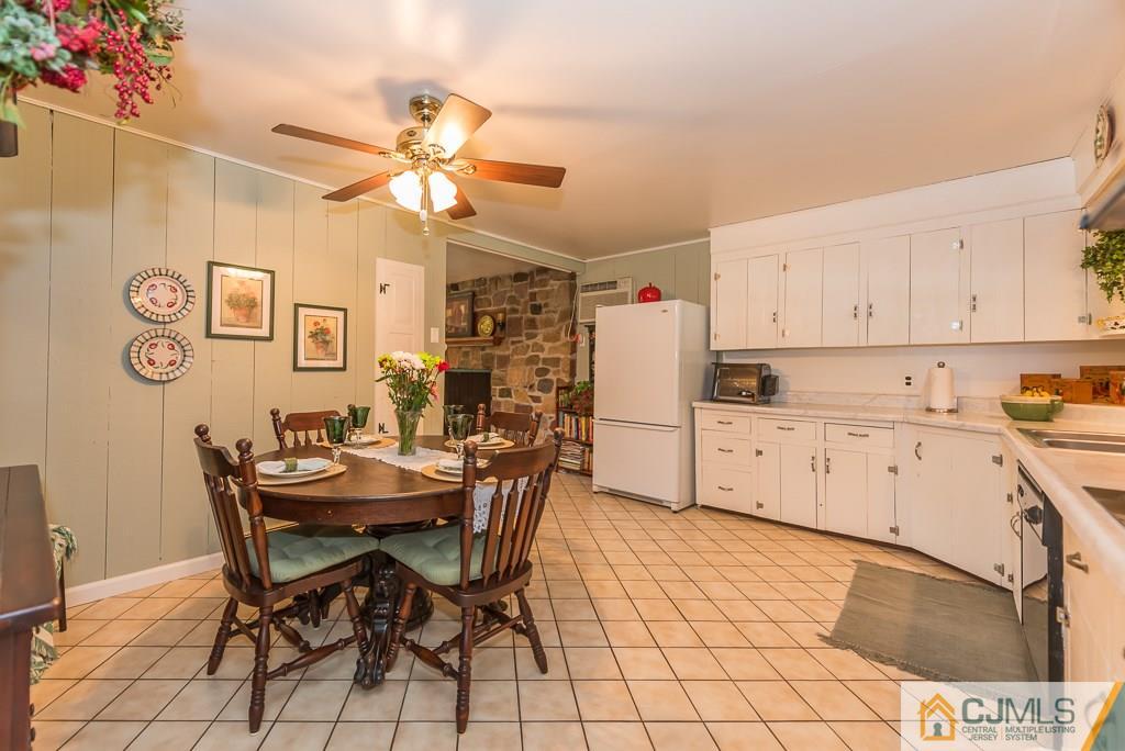 21 Mill Street Stockton, NJ 08559 - Photo 6 of 25 a view of a dining room with furniture