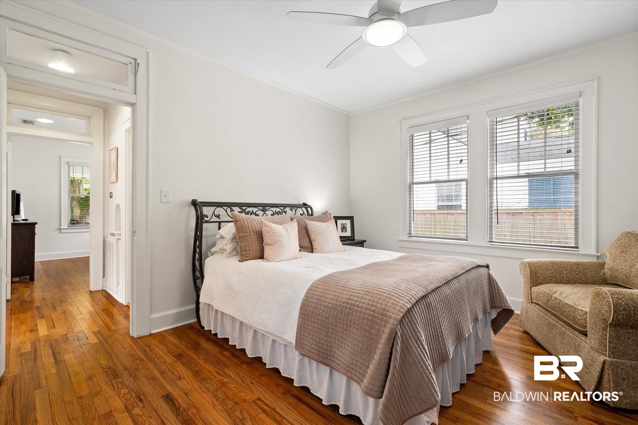 112 Crenshaw Street Mobile, AL 36606 - Photo 15 of 21 Bedroom featuring crown molding, baseboards, a ceiling fan, and hardwood / wood-style flooring
