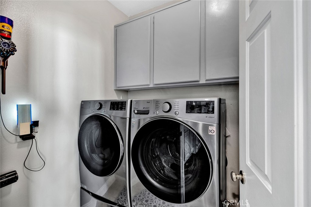 9 Darlington Irvine, CA 92620 - Photo 16 of 21 a utility room with dryer and washer