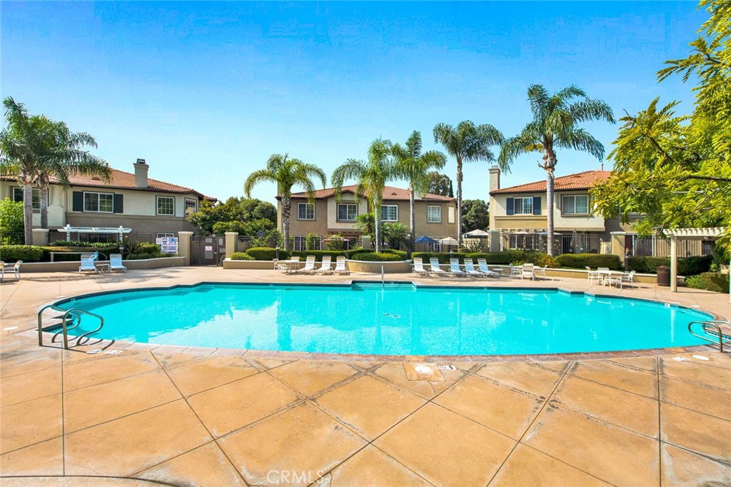 9 Darlington Irvine, CA 92620 - Photo 19 of 21 a view of swimming pool with outdoor seating and a garden