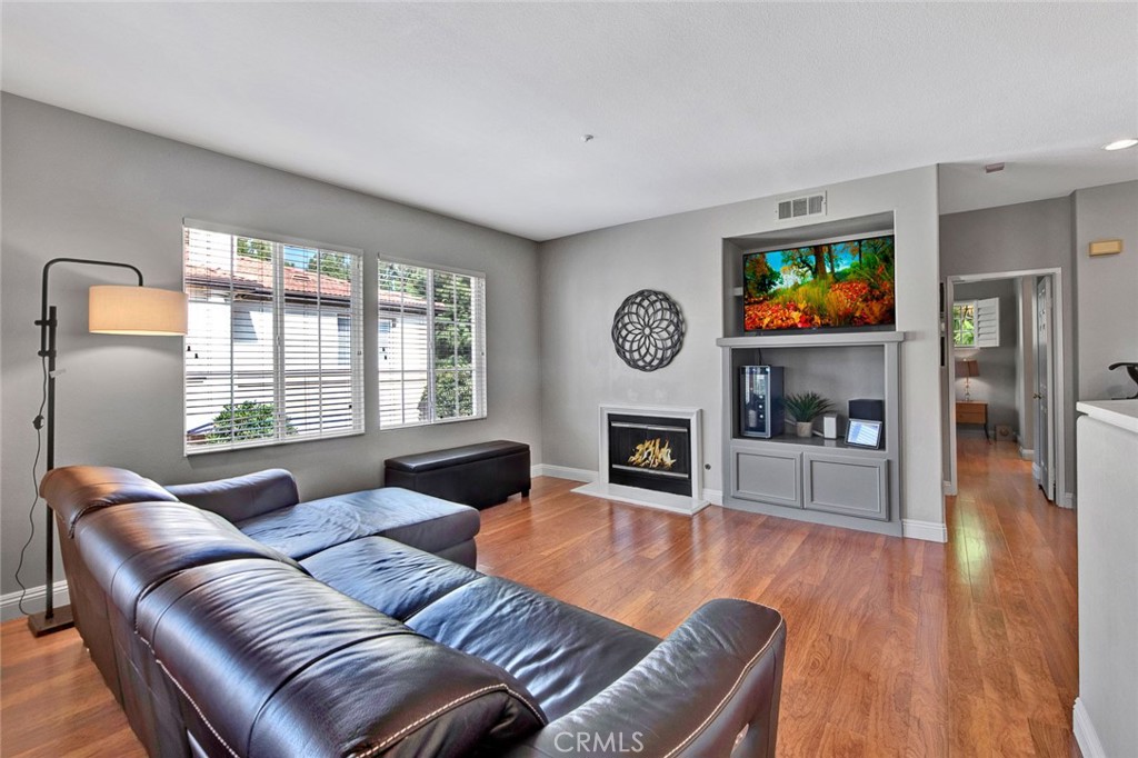 9 Darlington Irvine, CA 92620 - Photo 5 of 21 a living room with furniture and a fireplace