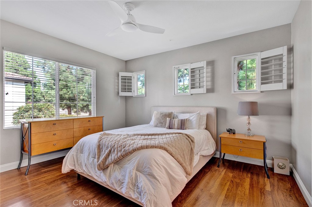 9 Darlington Irvine, CA 92620 - Photo 9 of 21 a bedroom with a bed wooden floor and window