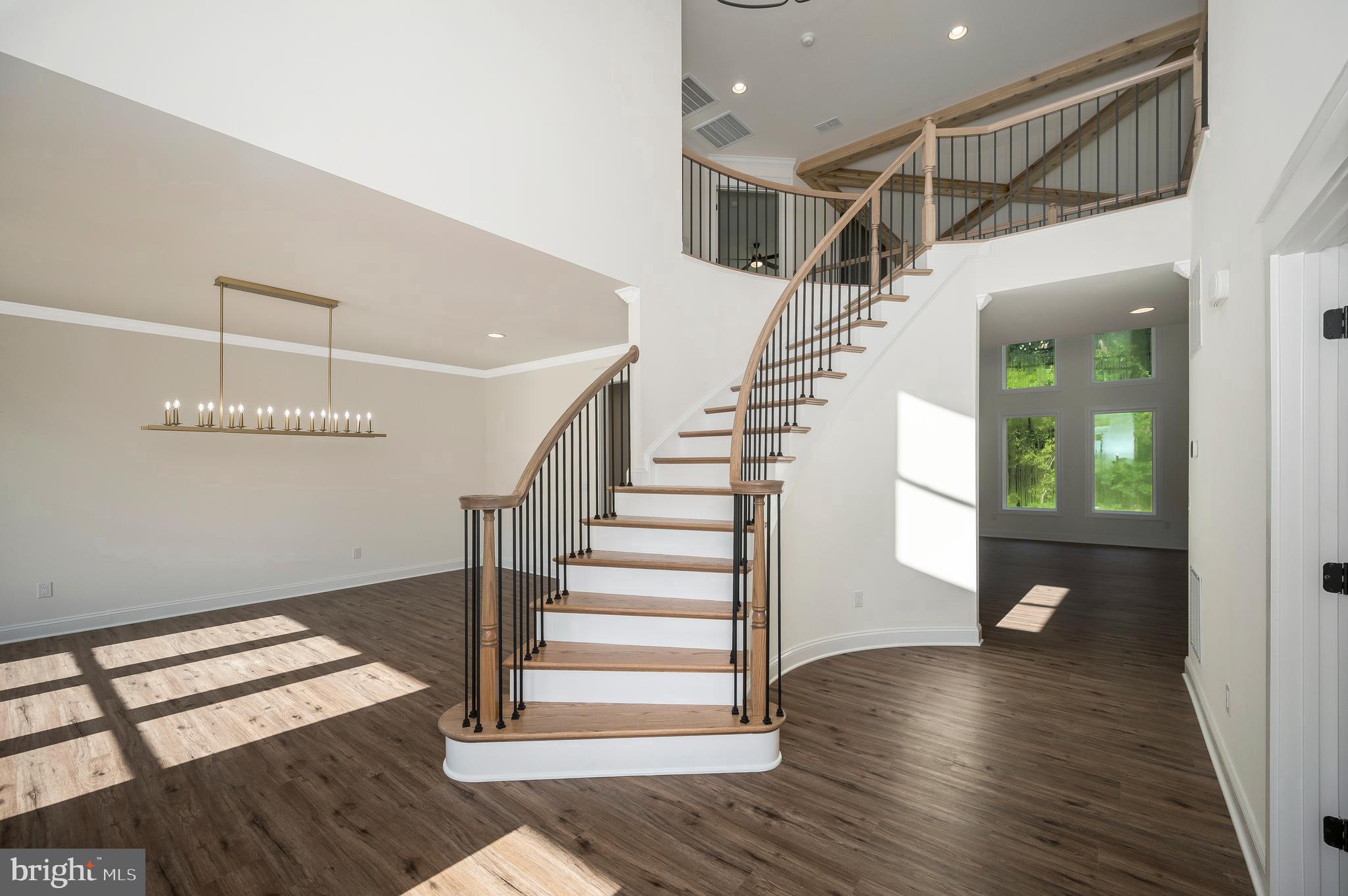 13208 Bristow Road Nokesville, VA 20181 - Photo 2 of 58 Elegant foyer with sweeping staircase.