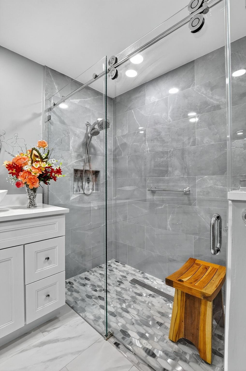 12614 Tiboli Chase Court, Unit 1 Boca Raton, FL 33496 - Photo 22 of 62 a bathroom with a shower and a sink