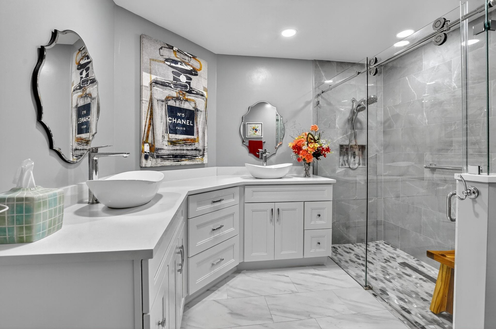 12614 Tiboli Chase Court, Unit 1 Boca Raton, FL 33496 - Photo 3 of 62 a bathroom with a sink double vanity and a mirror