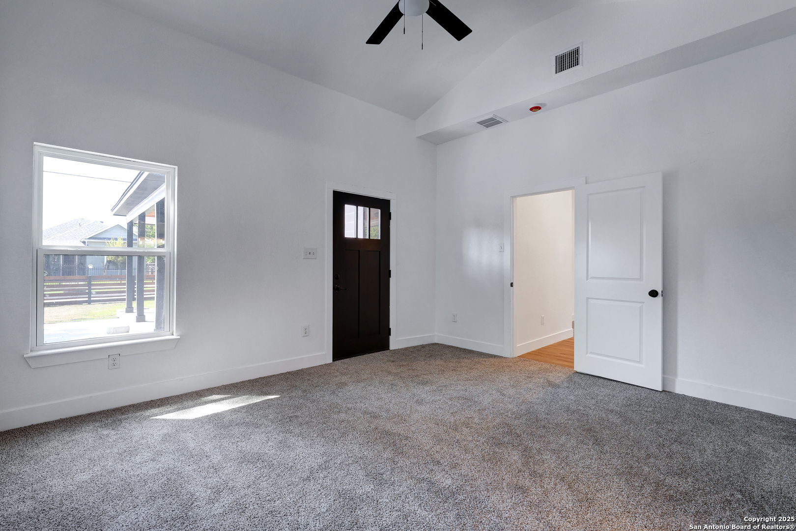 2425 Monterey Street San Antonio, TX 78207 - Photo 18 of 35 a view of an empty room with a window
