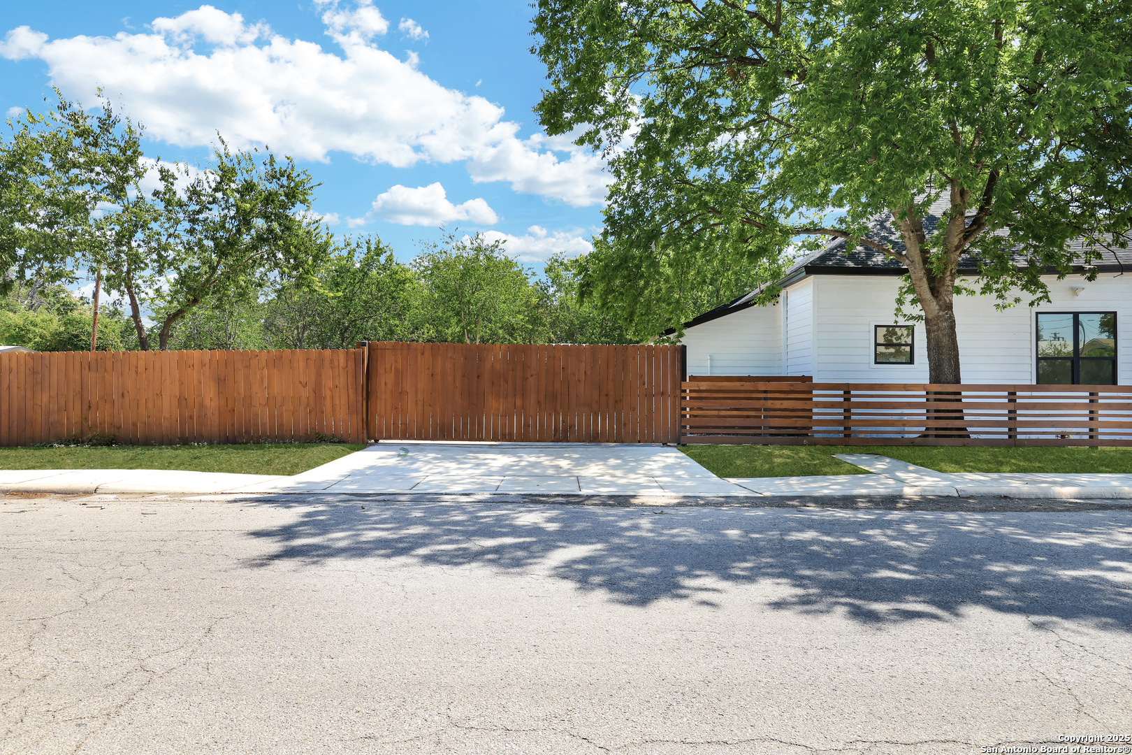 2425 Monterey Street San Antonio, TX 78207 - Photo 35 of 35 a front view of a house with a yard