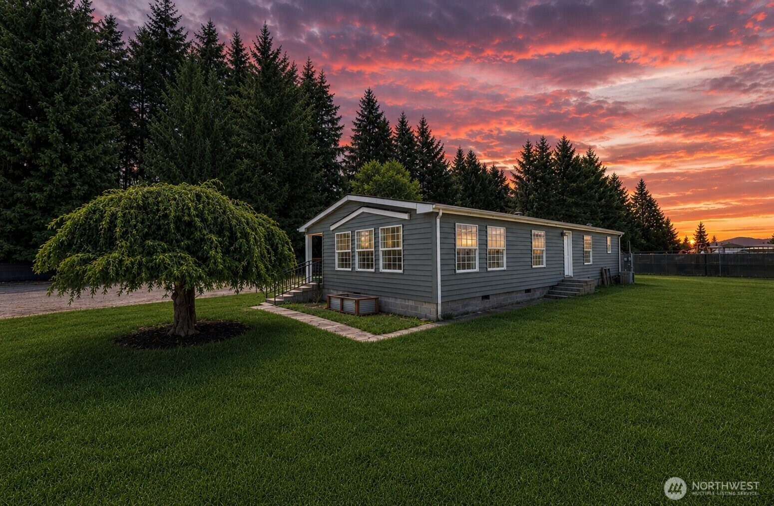241 Foster Creek Road, Unit B Toledo, WA 98591 - Photo 1 of 23 a backyard of a house with table and chairs