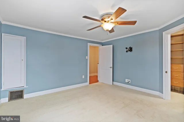 an empty room and window