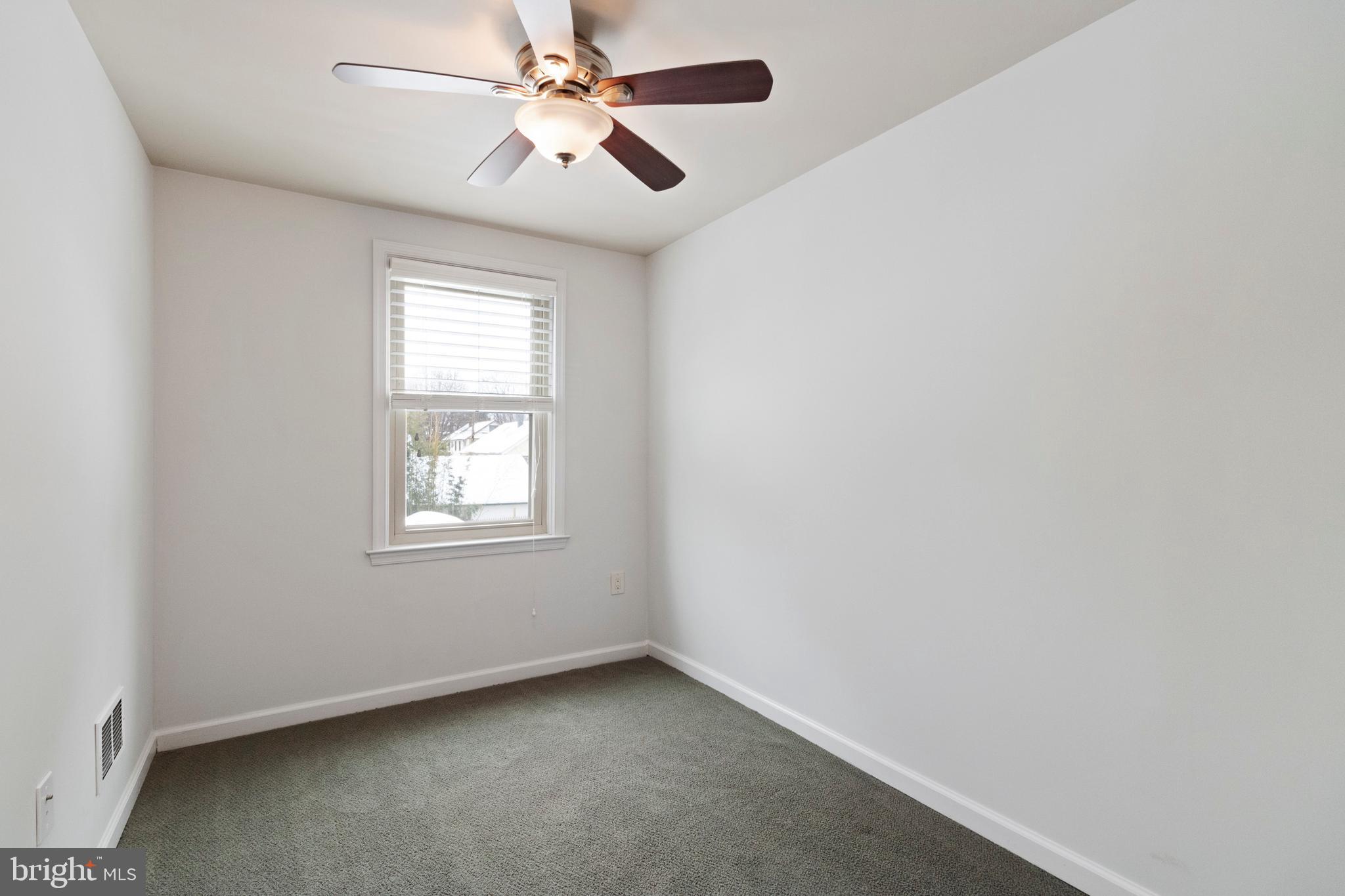 480 Jacksonville Road Hatboro, PA 19040 - Photo 28 of 34 an empty room with a window and a fan