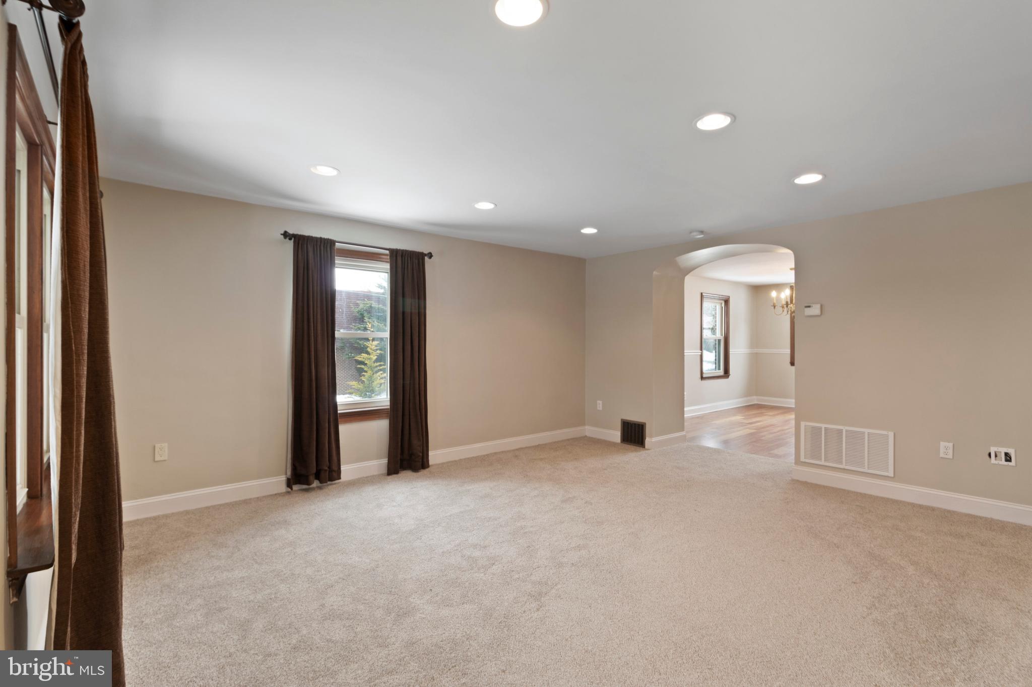 480 Jacksonville Road Hatboro, PA 19040 - Photo 3 of 34 an empty room with windows and entrance