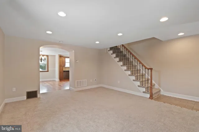 a view of an entryway with a hallway