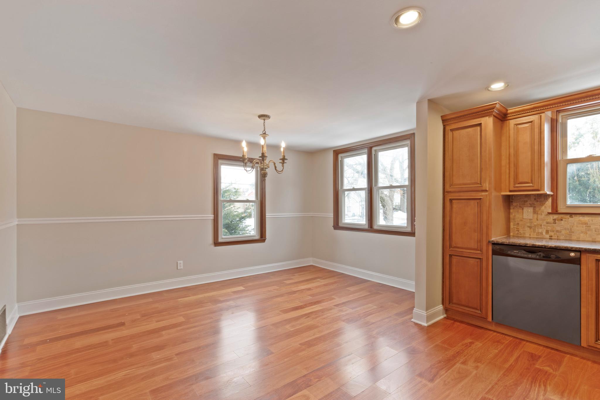 480 Jacksonville Road Hatboro, PA 19040 - Photo 10 of 34 an empty room with wooden floor cabinet and windows