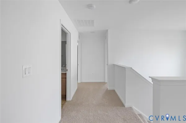 a view of hallway with closet