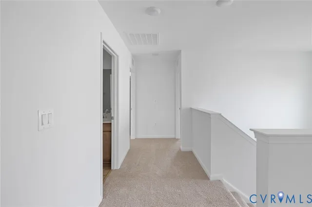 a view of hallway with closet