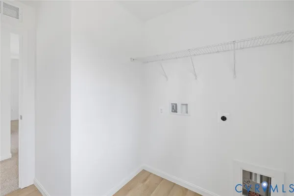 a view of a room that has a window in it