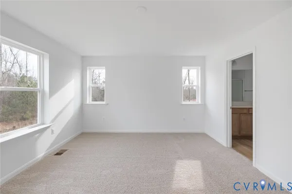 a bathroom with a sink toilet and a mirror