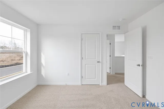 a view of a swimming pool with an outdoor space and seating area