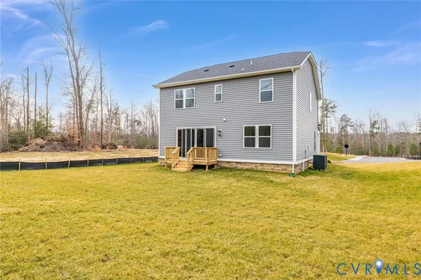 a view of a swimming pool with an outdoor space and seating area